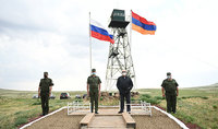 State flags of Armenia and Russia waving on the border symbolize our friendly relations
